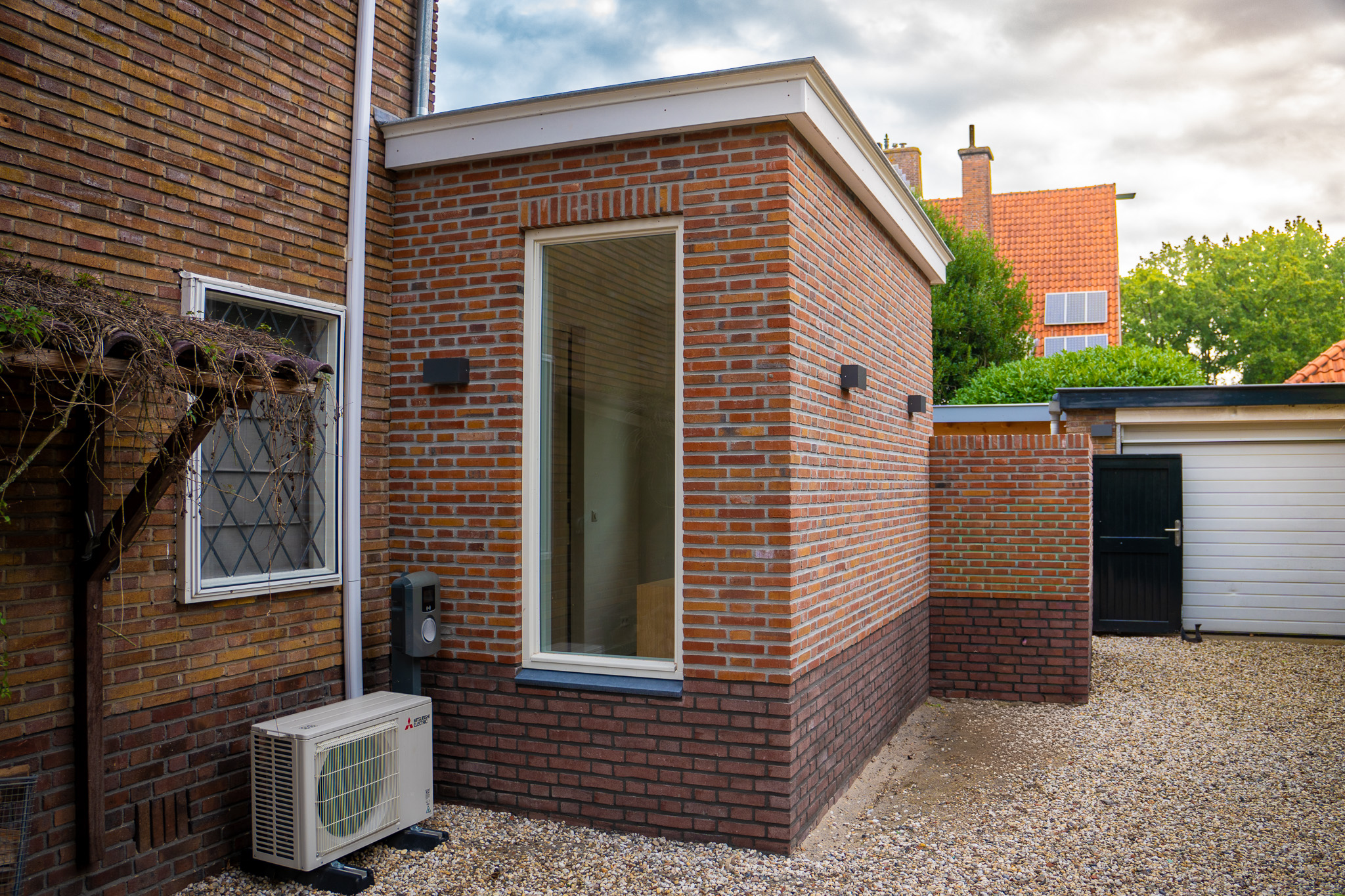 Uitbouw van een 2-onder-1-kapwoning in Baarn